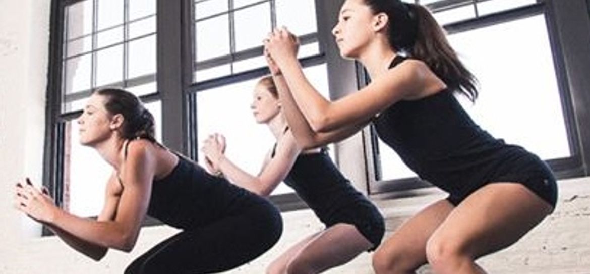 Girls warming up before Irish dance class