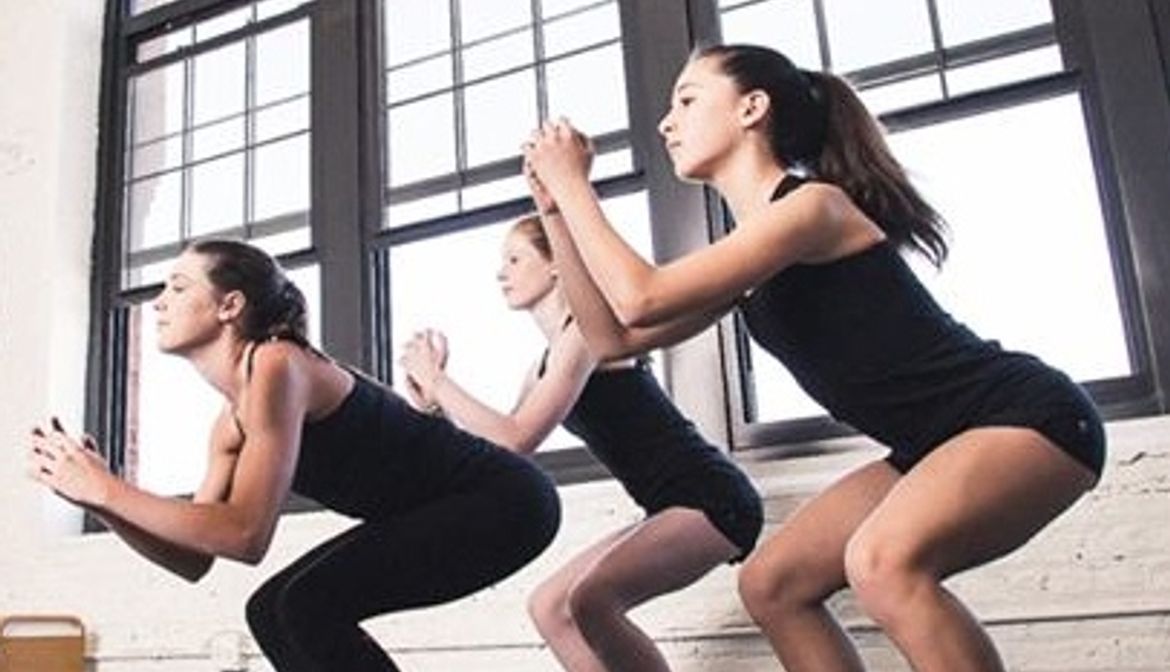 Girls warming up before Irish dance class